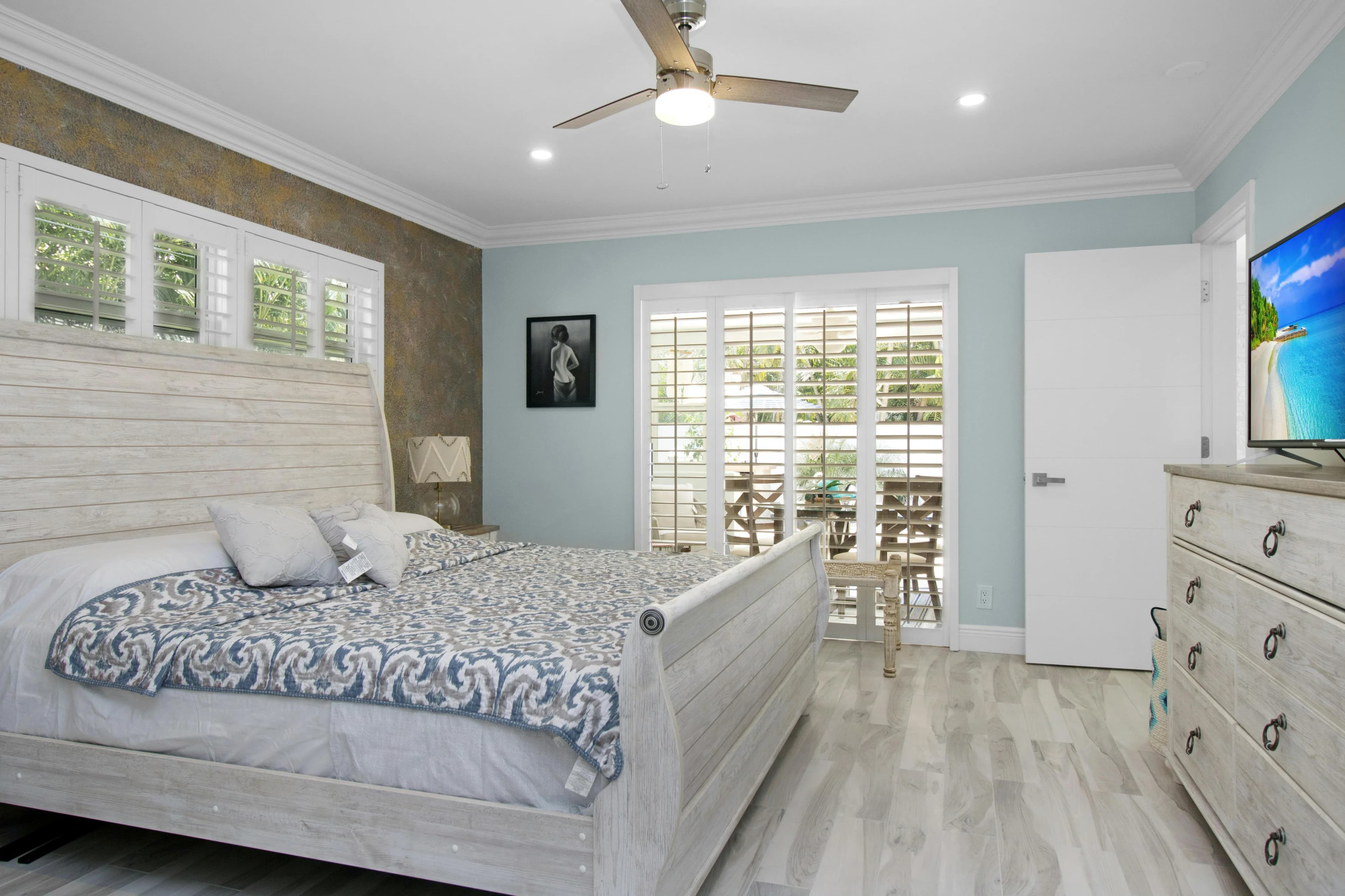 Bedroom with wooden shutters
